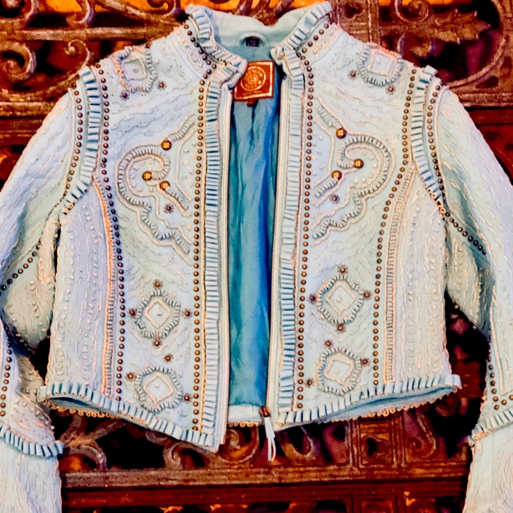 Western torquoise jacket. Fits like a medium.